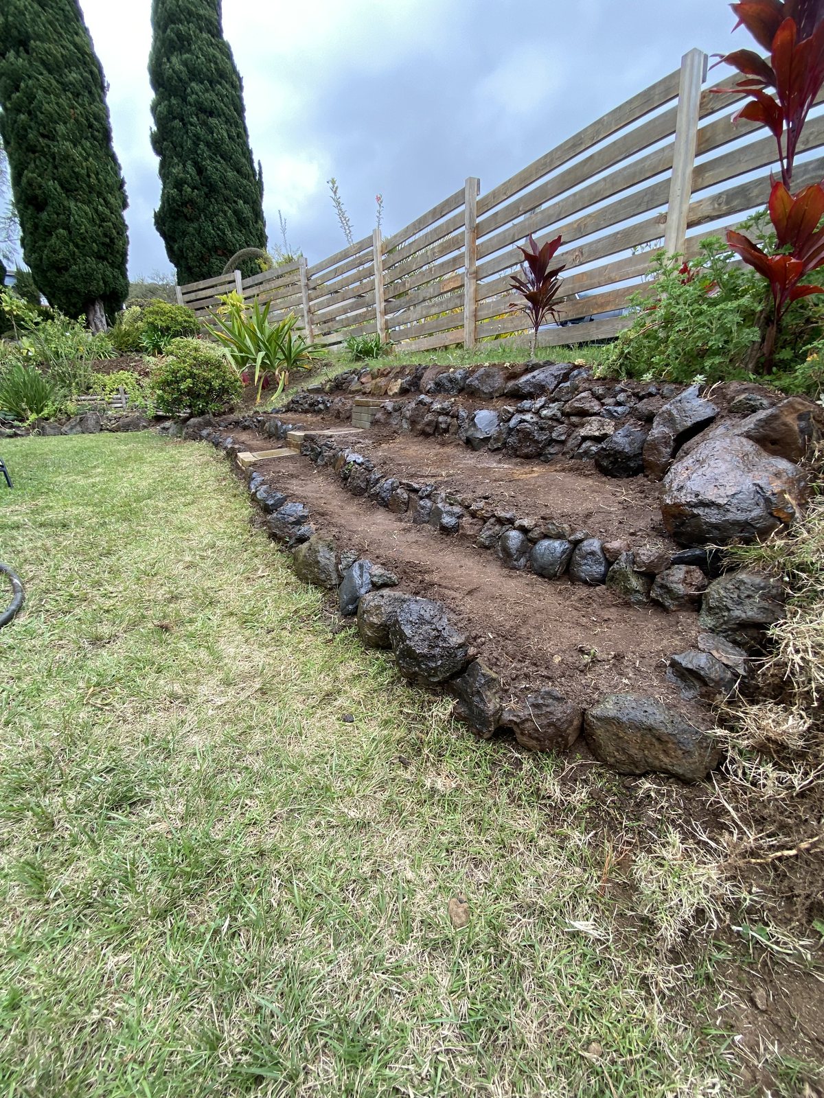 A finished Roots to Fruits lava rock project